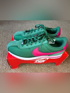 Nike Green Sneakers with Pink Swoosh
